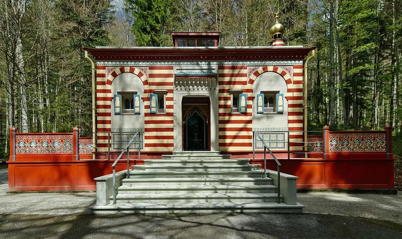 The Moroccan House, painted in red and white stripes, at the top of a flight of steps