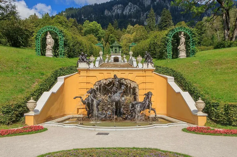 The Neptune fountain below the cascade, statues flanking the water on both sides