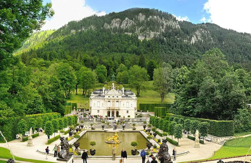 The parterre in front of the palace, its beds cut into the lawn in formal shapes